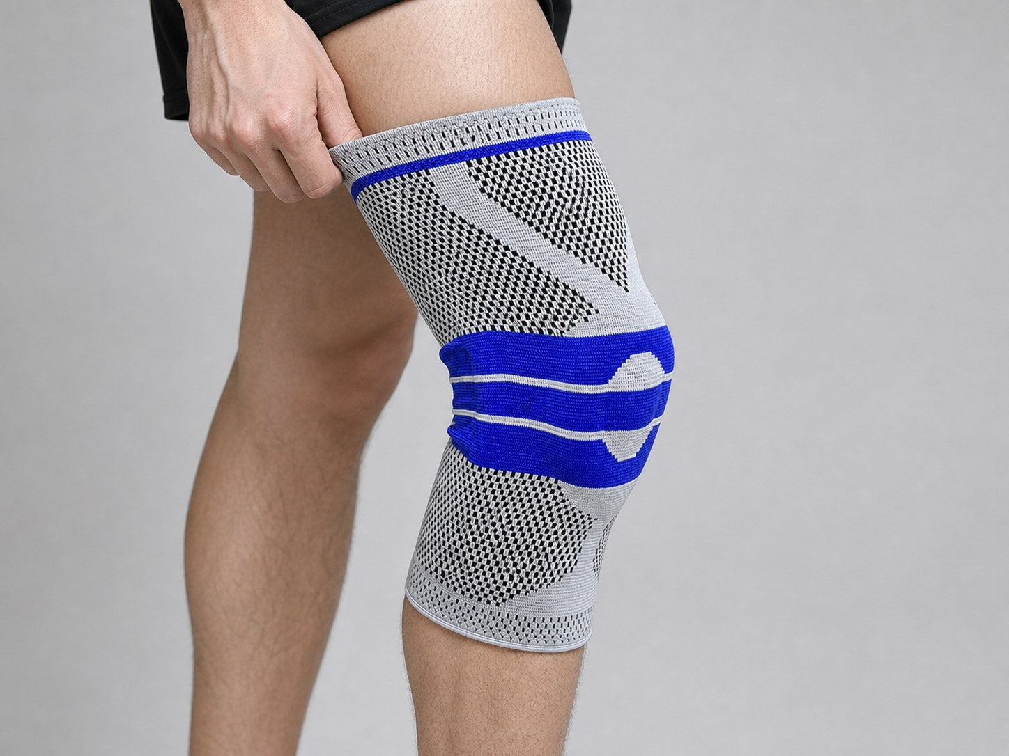 AlignaFit knee sleeve fitted, cuff sitting above the knee