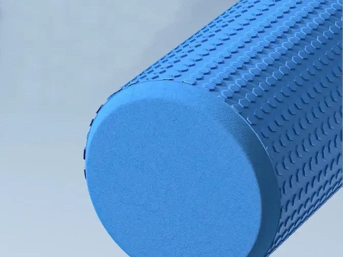 Close-up of the AlignaFit foam roller's raised trigger point surface