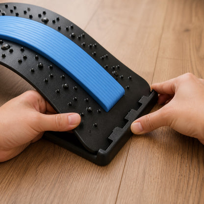 Hands clicking the AlignaFit back stretcher board into an arch level on the base