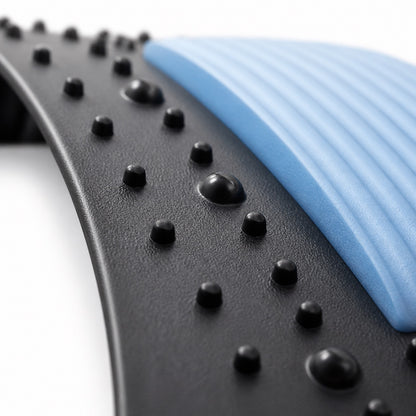 Close-up of the AlignaFit back stretcher acupressure nubs and ribbed blue foam pad