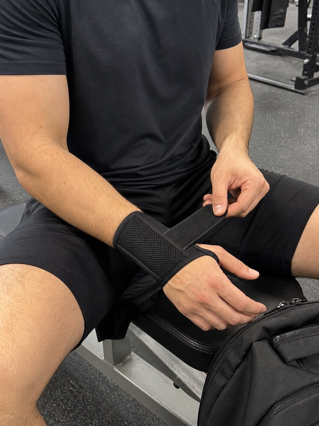 Adjusting the strap of the AlignaFit wrist brace